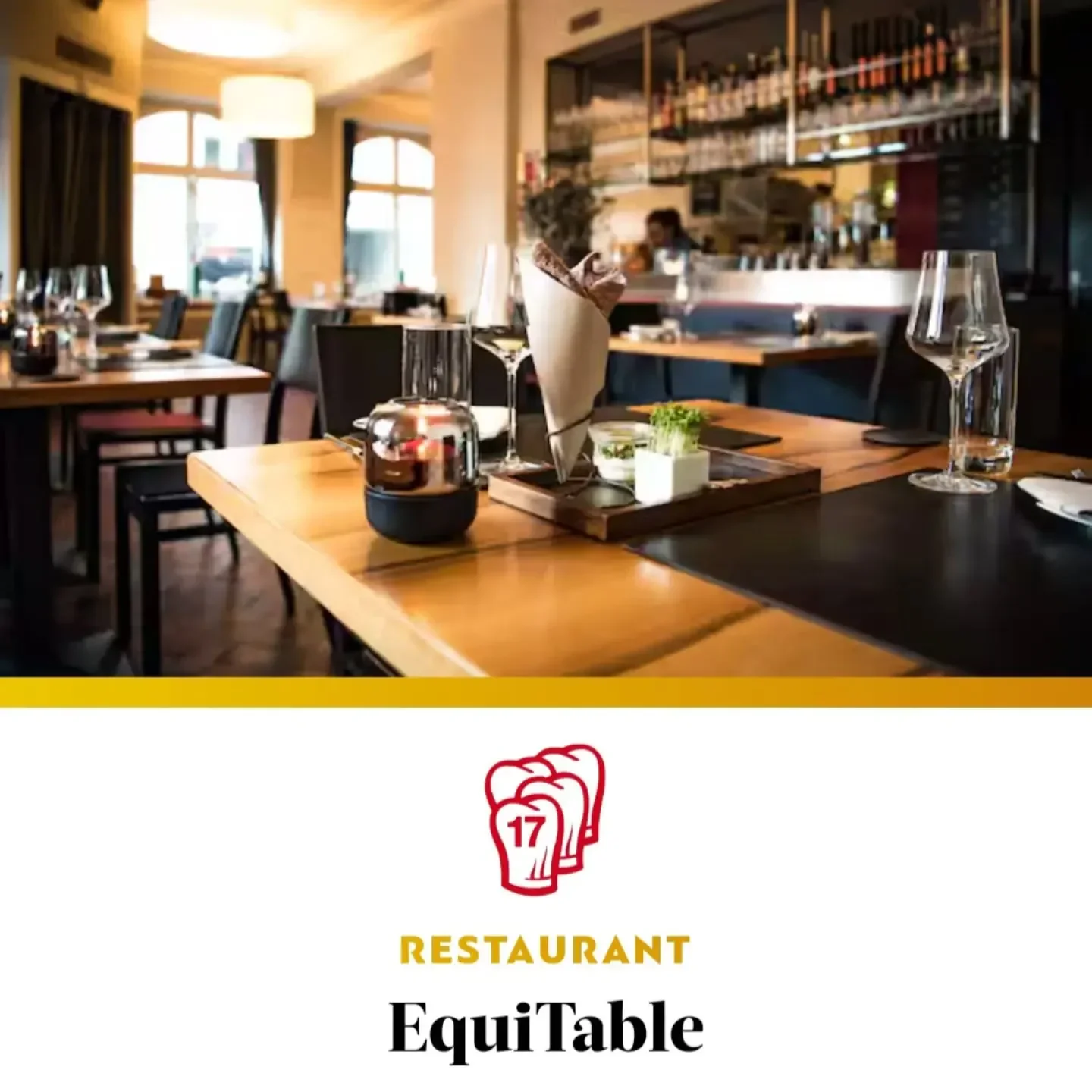 Interior dining at EquiTable restaurant in Zurich, showcasing elegant table setting.