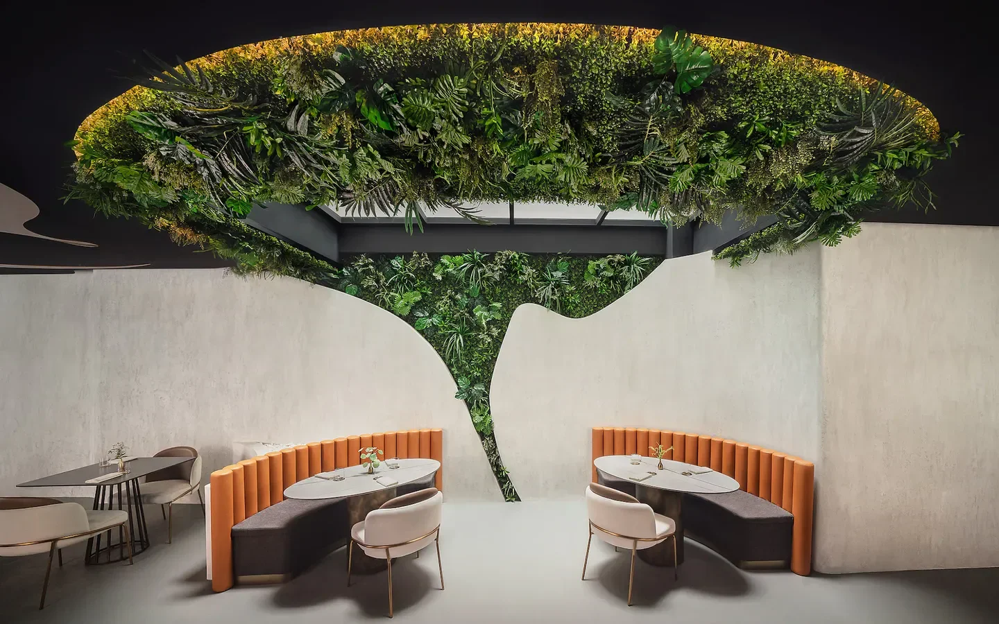 Euphoria Singapore restaurant's stylish interior with unique design and lush greenery