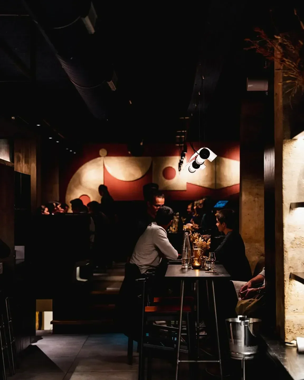Interior view of FIEF restaurant in Paris, featuring diners and modern decor.