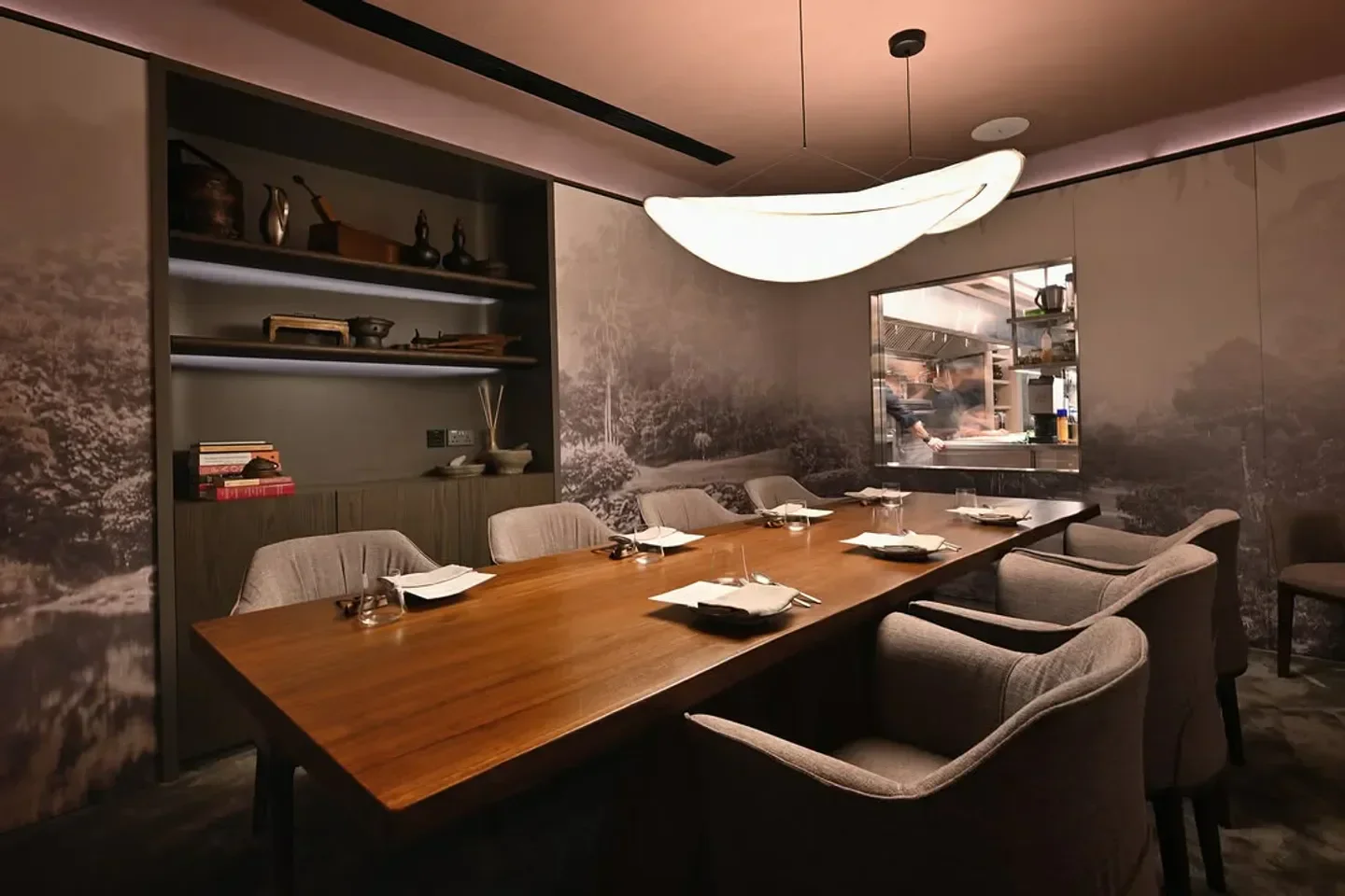 Elegant dining room at Fiz restaurant in Singapore, featuring a modern design.