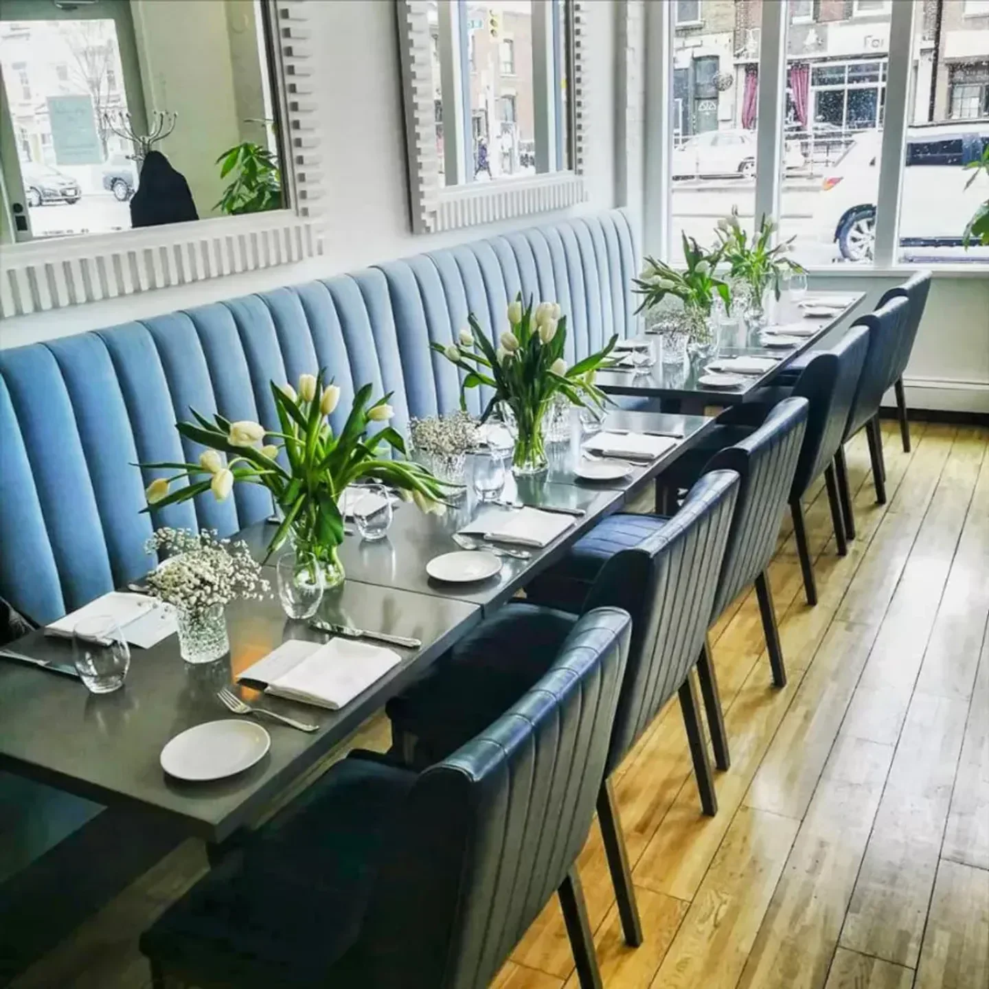 Elegant interior of FK restaurant in Toronto, with stylish table setting and decor