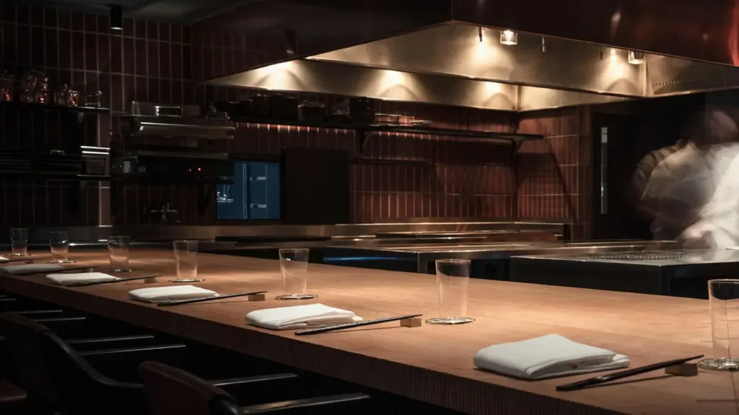 Interior of Frantzén in Stockholm. Dining counter with prepared place settings.
