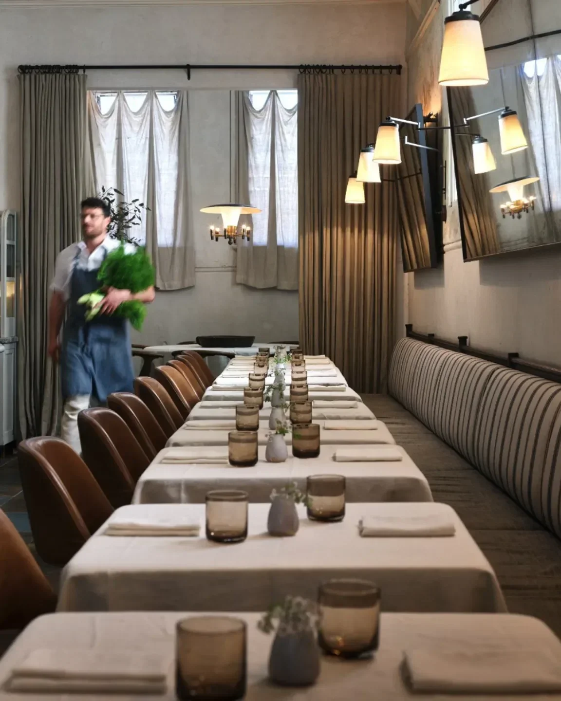 Elegant dining room interior at Fred's in Sydney, ready for service.
