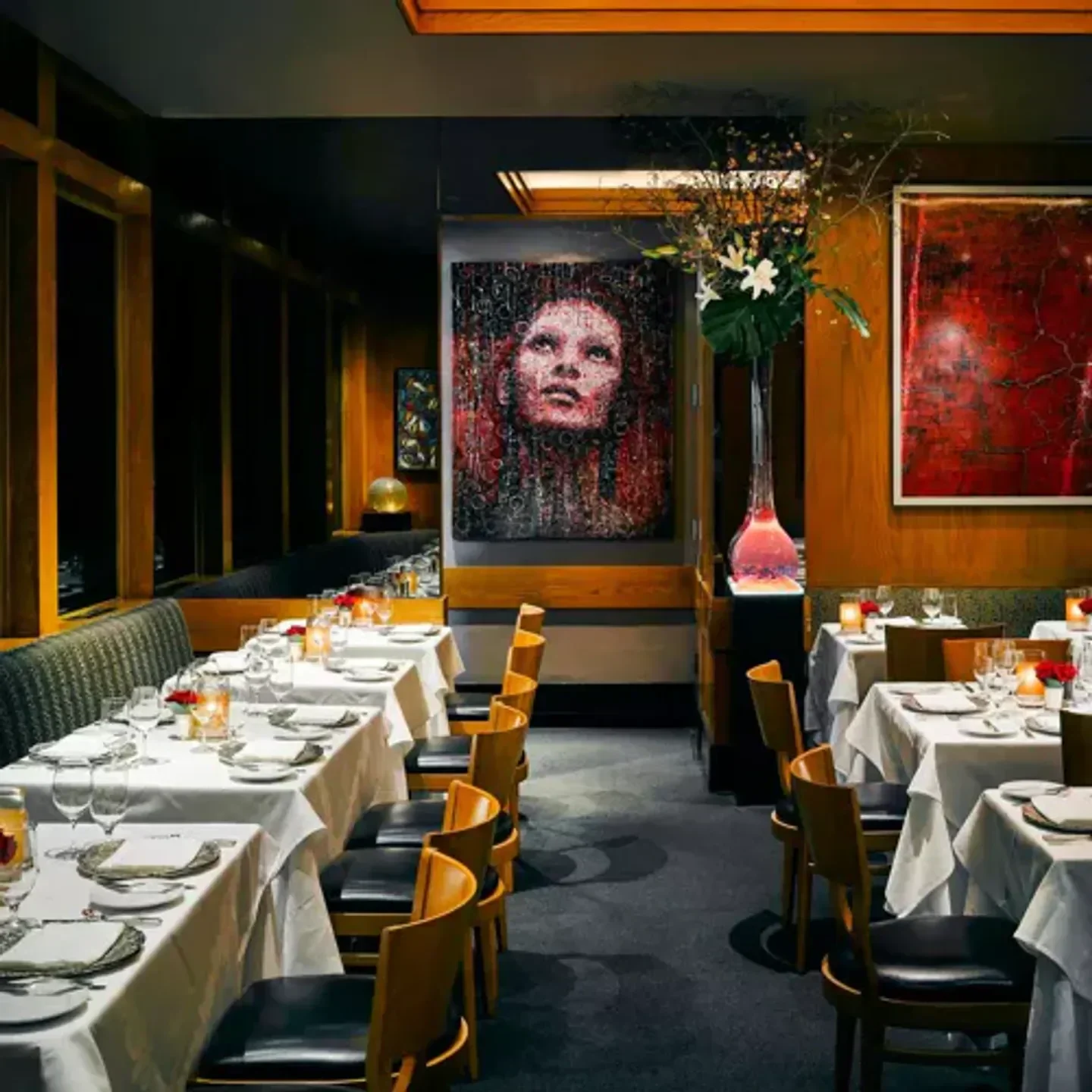 Elegant dining room interior at Gary Danko in San Francisco, with art and tables.