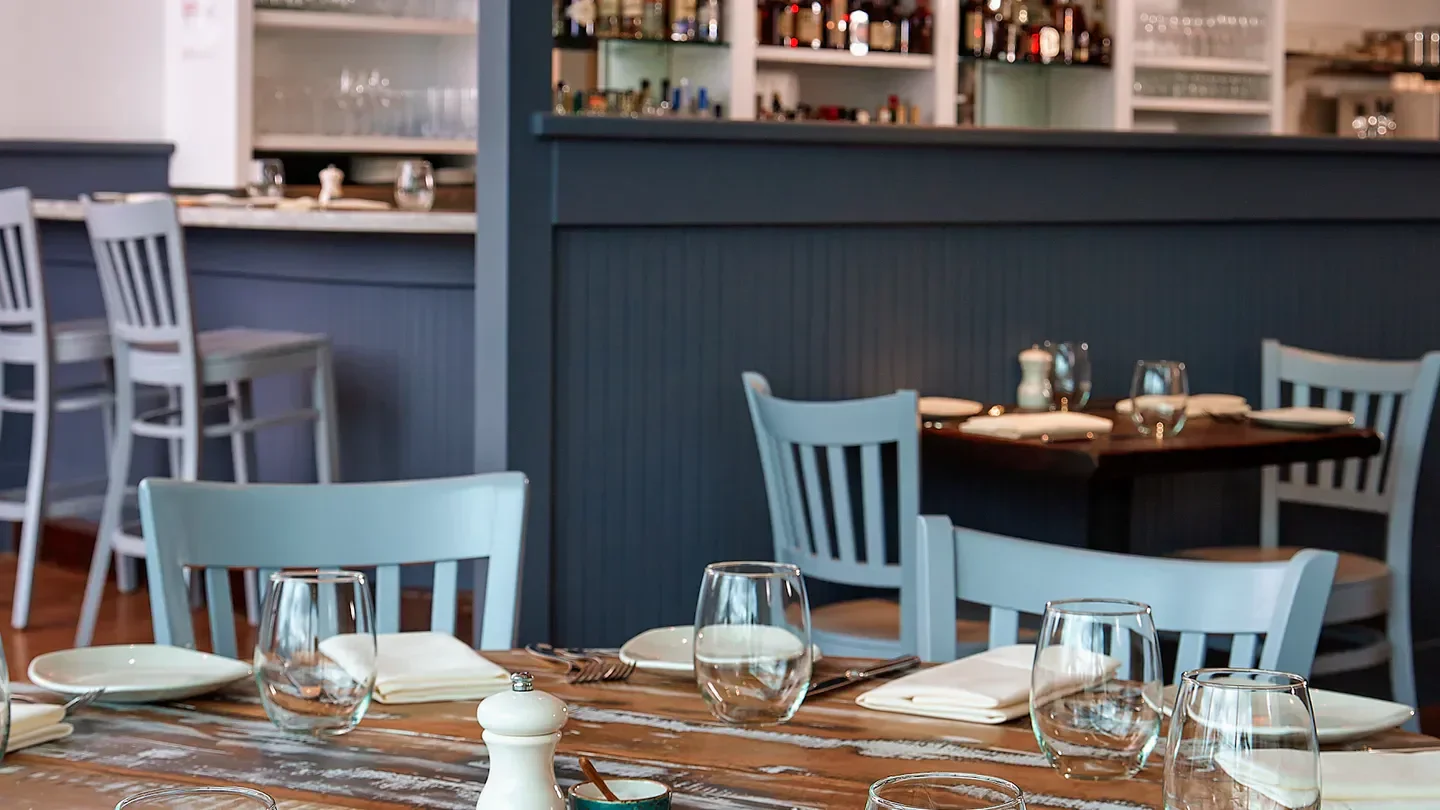 Gemma restaurant in Dallas, featuring elegant table settings and stylish decor.