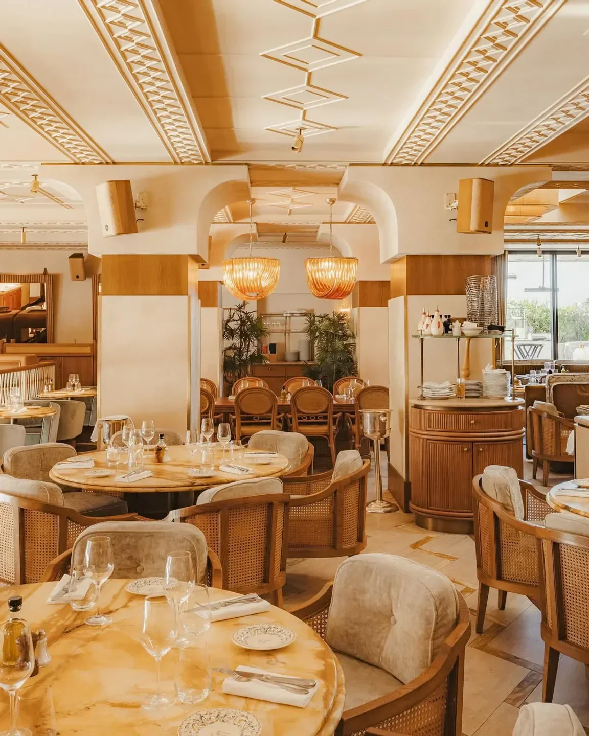 Elegant dining room interior at Gigi restaurant in Paris, featuring stylish decor and ambiance.