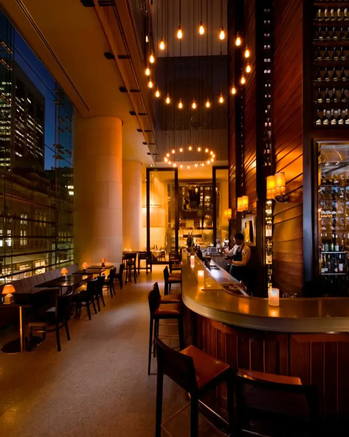 Glass Brasserie in Sydney: A stylish bar with city views and elegant lighting.