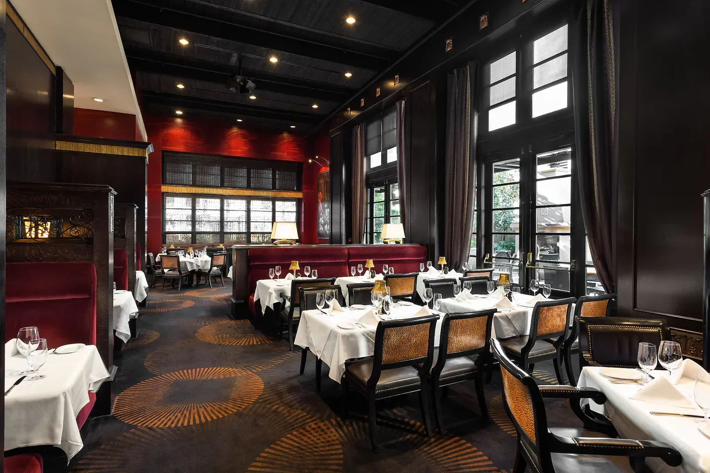 Elegant dining room interior at Gotham Steakhouse & Cocktail Bar in Vancouver, Canada.
