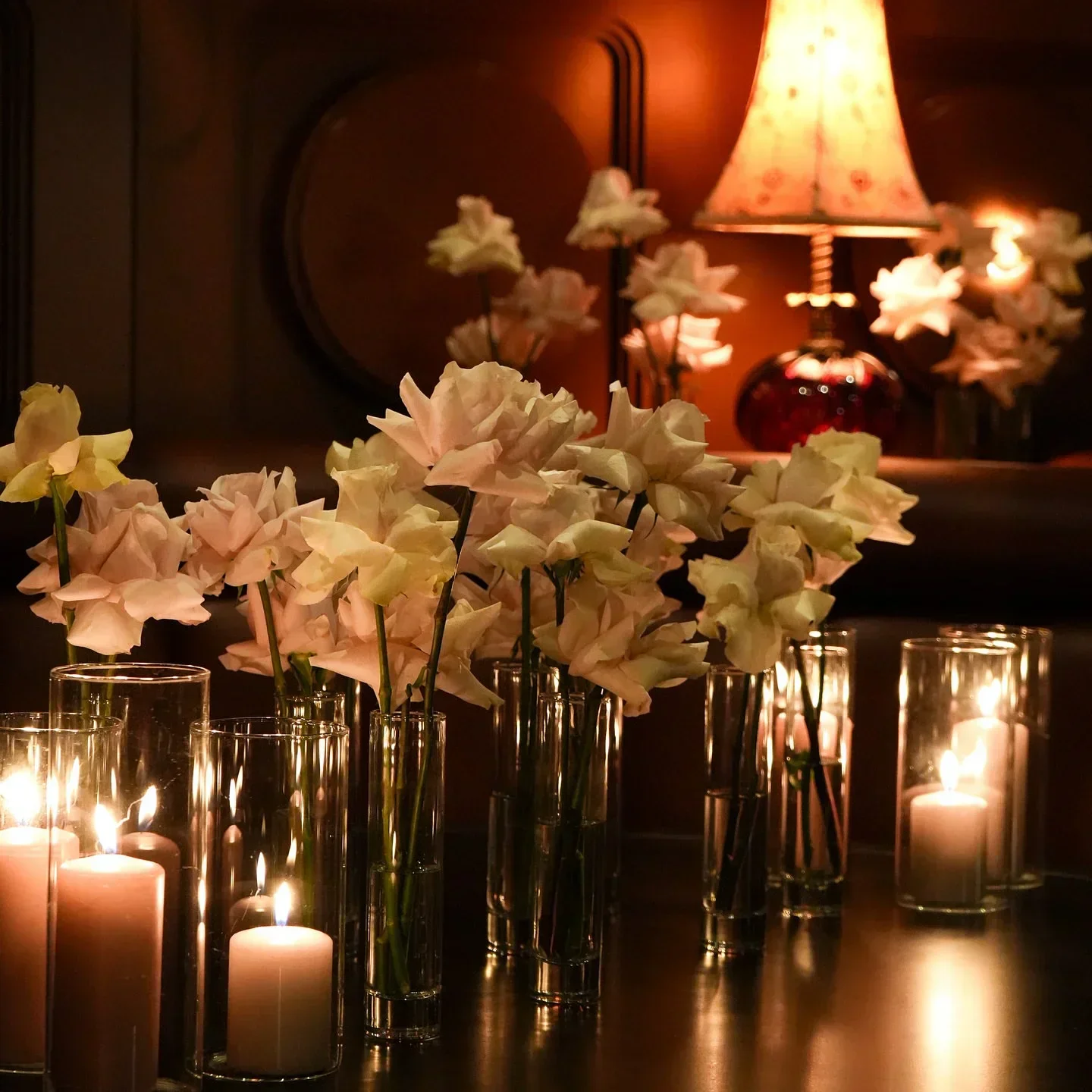 Romantic candlelit table setting at Harbour 60 Toronto restaurant in Toronto, with flowers.