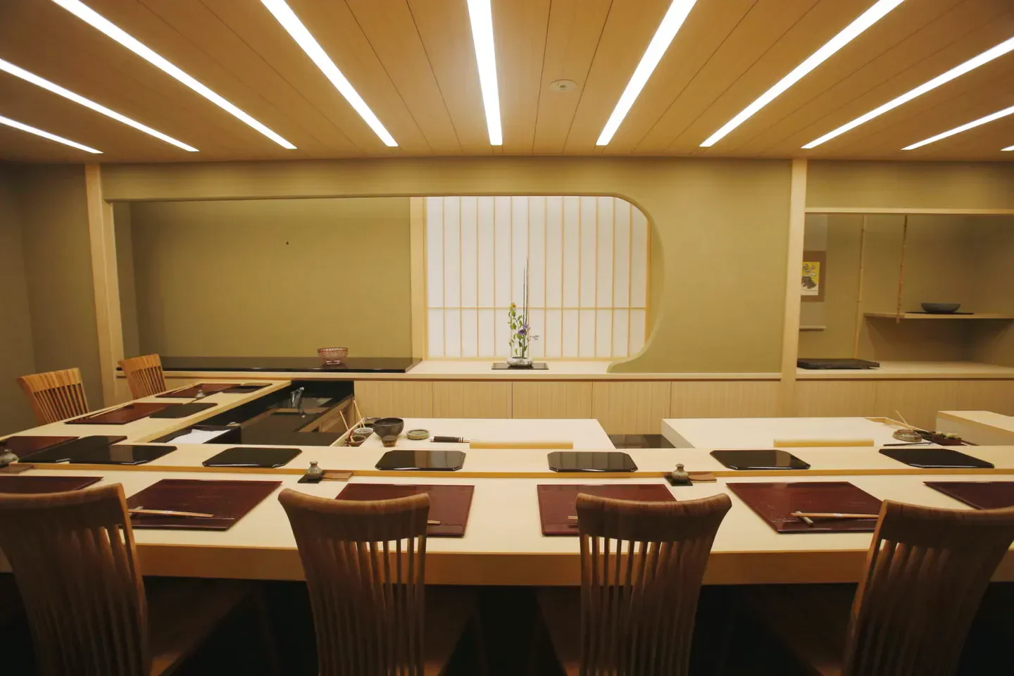 Elegant dining space at Harutaka restaurant in Tokyo, featuring traditional Japanese decor.