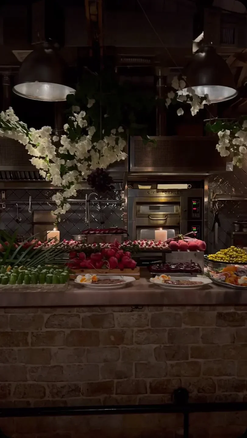 Delicious food display at HaSalon in Tel Aviv, a beautiful restaurant with fresh ingredients.