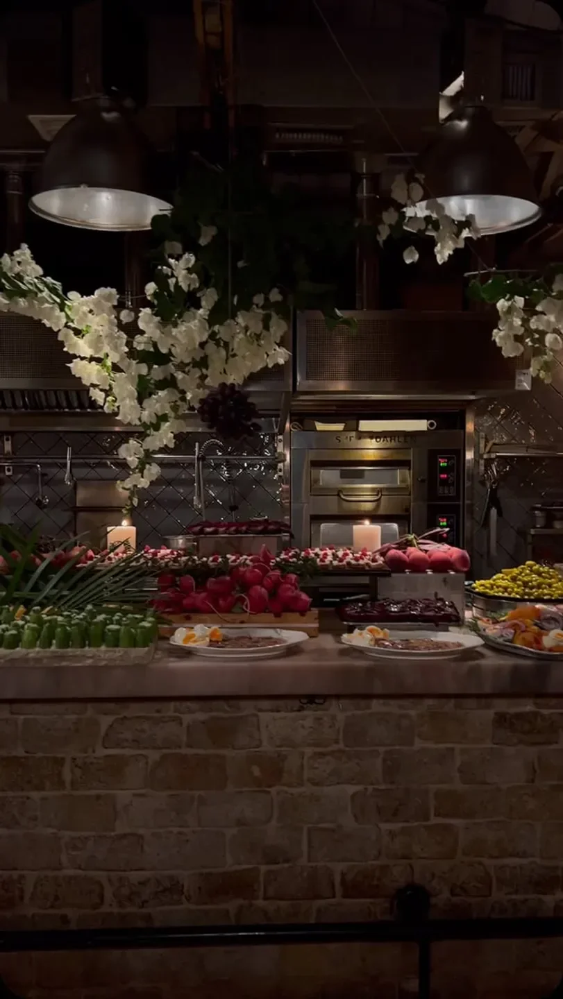 Delicious food display at HaSalon in Tel Aviv, a beautiful restaurant with fresh ingredients.