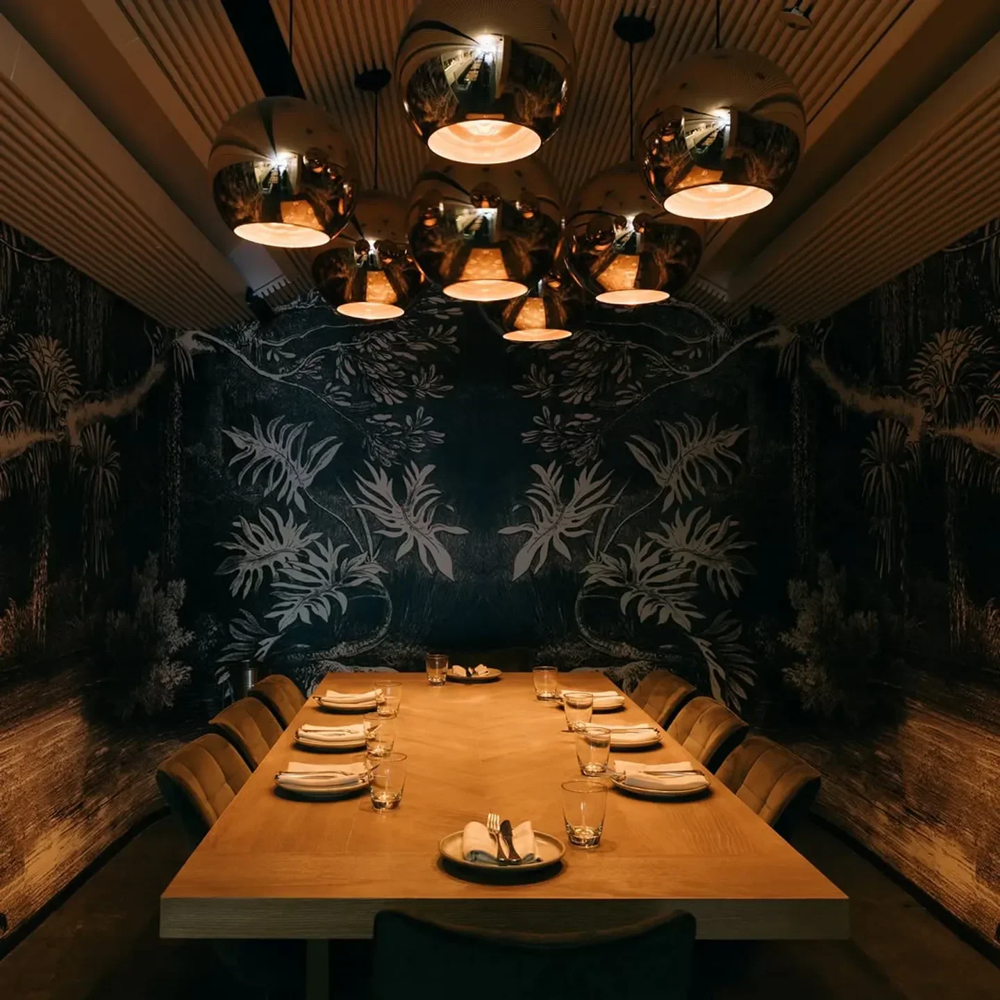Elegant dining room at Henrys Neutral Bay in Sydney, featuring unique lighting and decor.