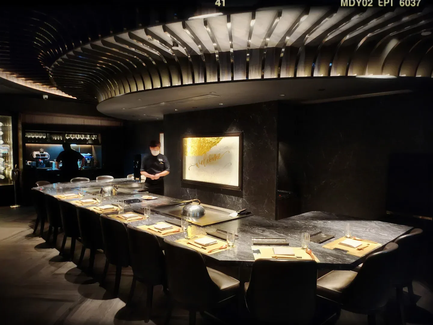 Interior of I M Teppanyaki & Wine in Hong Kong, with chef at the grill station