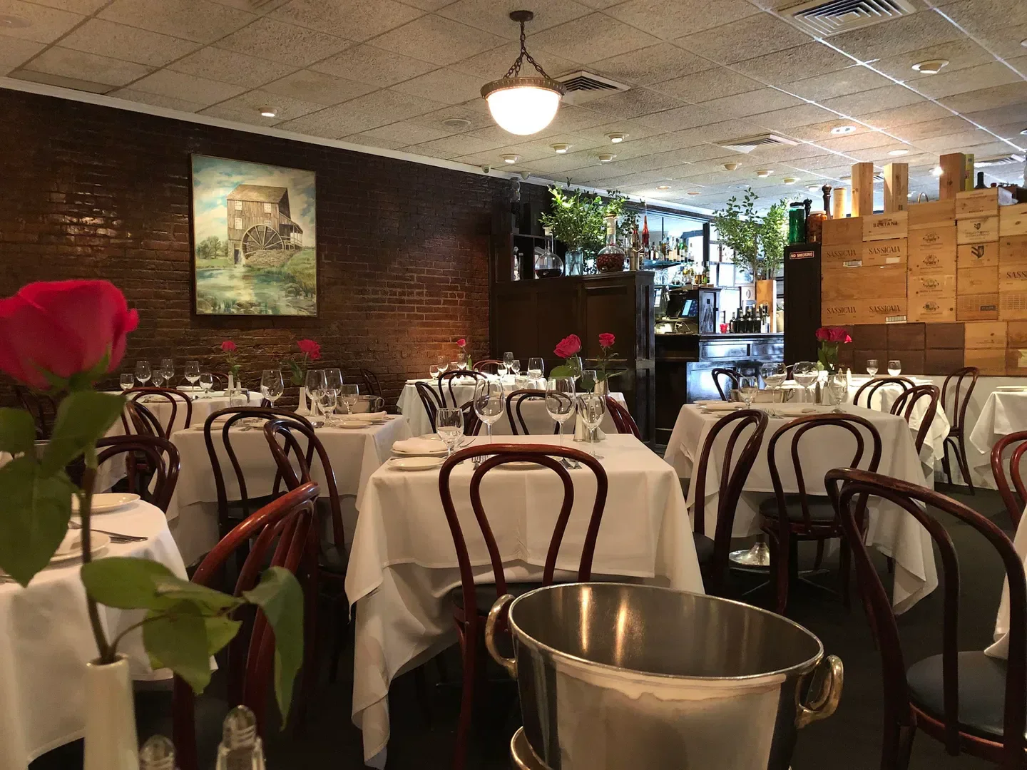 Cozy dining room at Il Mulino New York, a classic New York City restaurant.