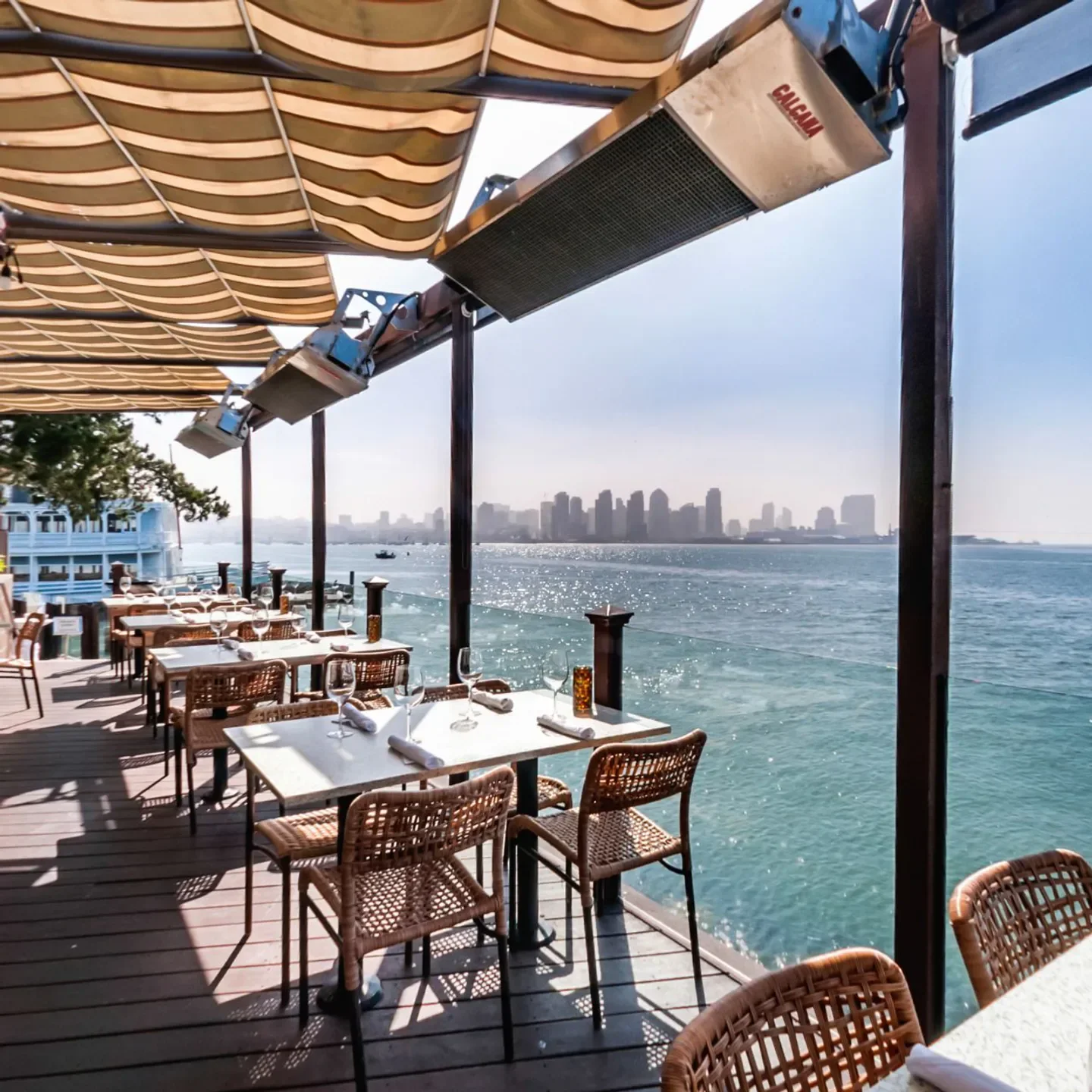 Island Prime restaurant in San Diego, waterfront dining with city skyline view.