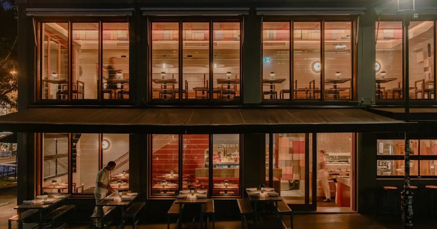 Exterior view of ItĹŤ restaurant in Sydney with warm lighting and inviting atmosphere.