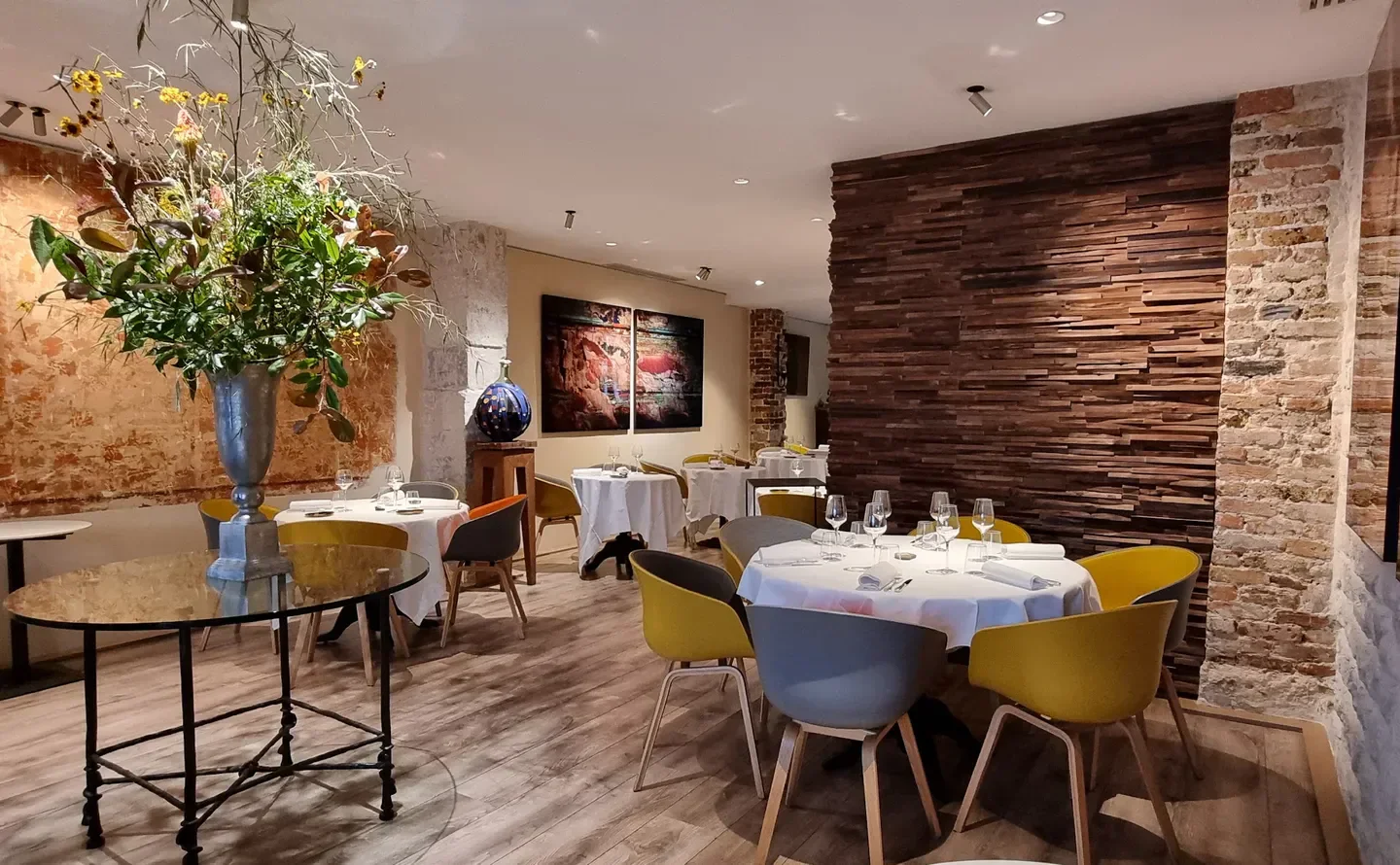 Interior dining at Jacques Faussat restaurant in Paris with a modern and cozy design
