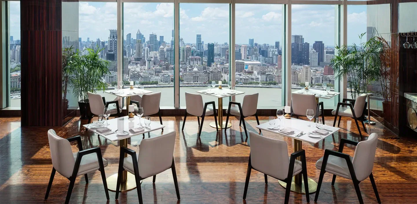 Jade on 36 restaurant in Shanghai with stunning city views and elegant decor.