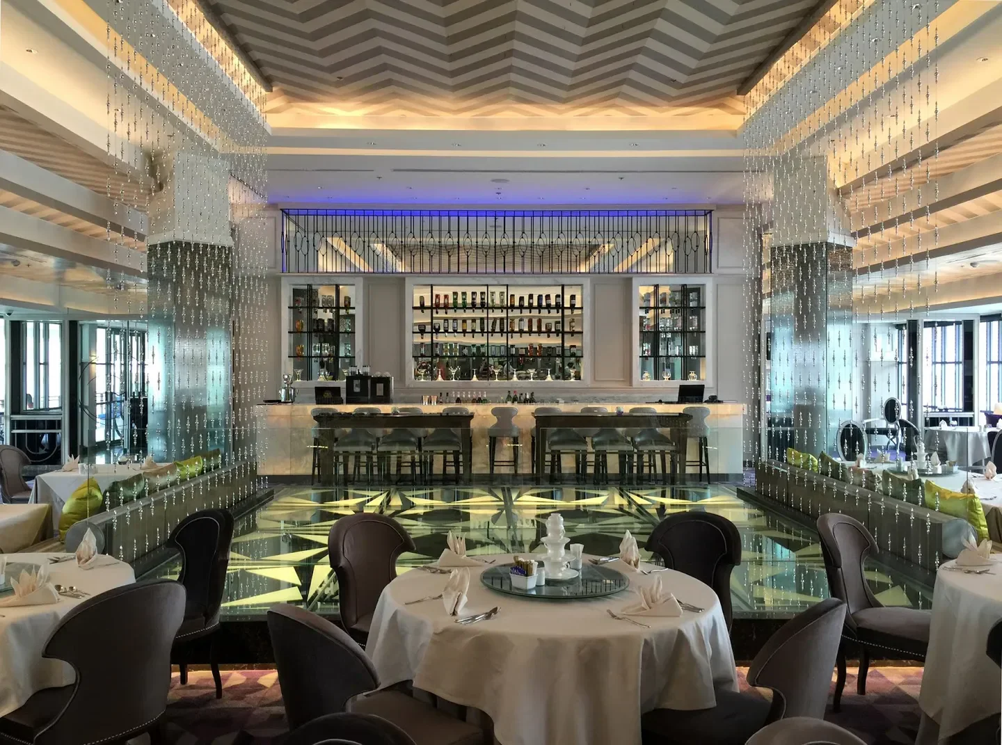Elegant interior of J'AIME by Jean-Michel Lorain in Bangkok, featuring a stylish bar area.