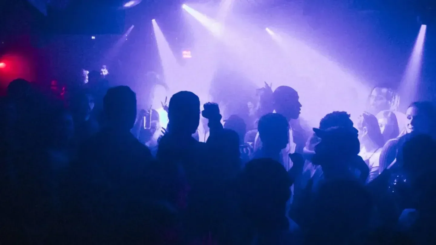 Energetic crowd enjoying the nightlife at Jamboree Dance Club in Barcelona