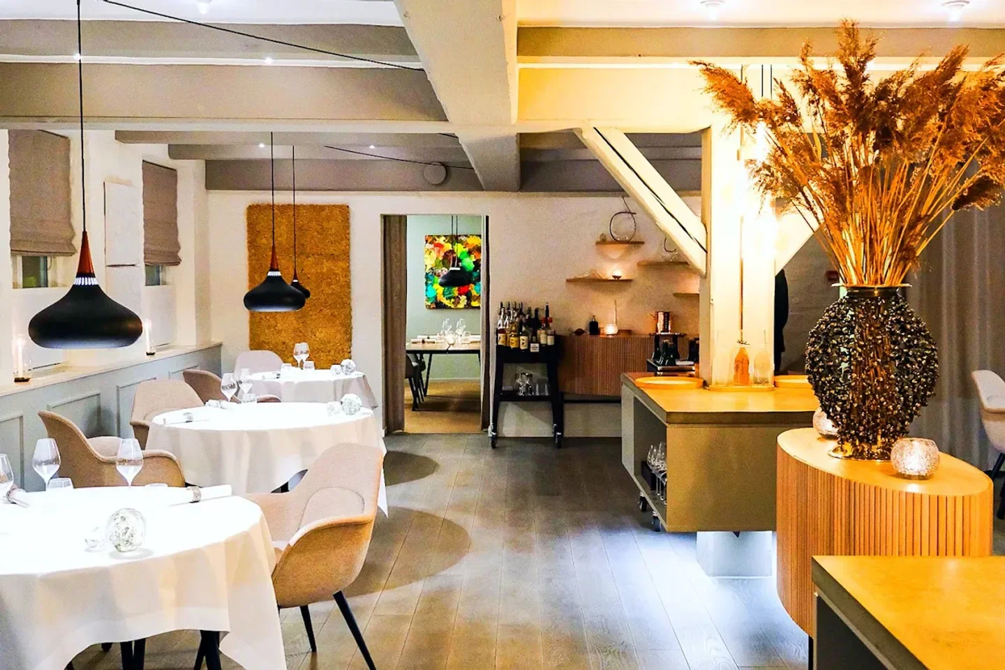 Interior of Jordnær restaurant in Copenhagen, featuring elegant decor and lighting.
