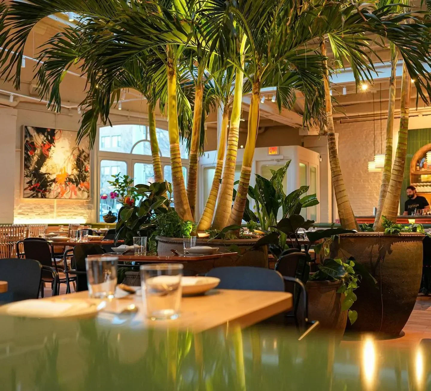 Kalaya restaurant in Philadelphia: Palm trees and stylish interior design.