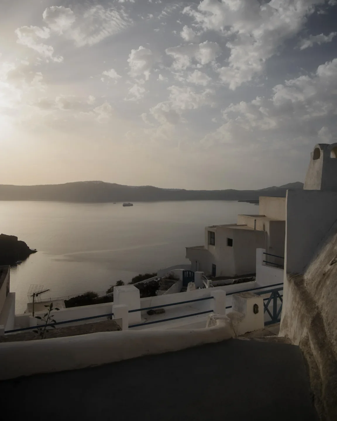 Scenic view of Kaliya restaurant overlooking the calm sea and distant islands at sunset