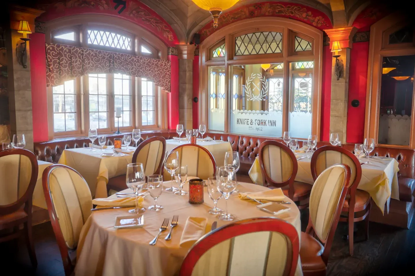 Elegant dining room interior at Knife and Fork Inn in Atlantic City, ready for dinner service.