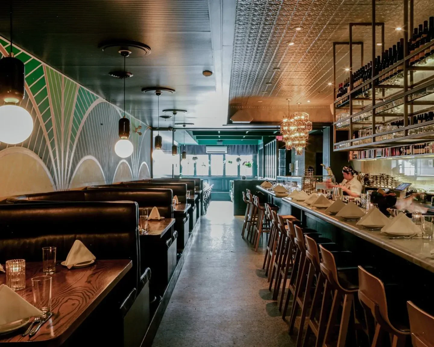 Interior of La Banane restaurant in Toronto, showcasing stylish bar and seating.