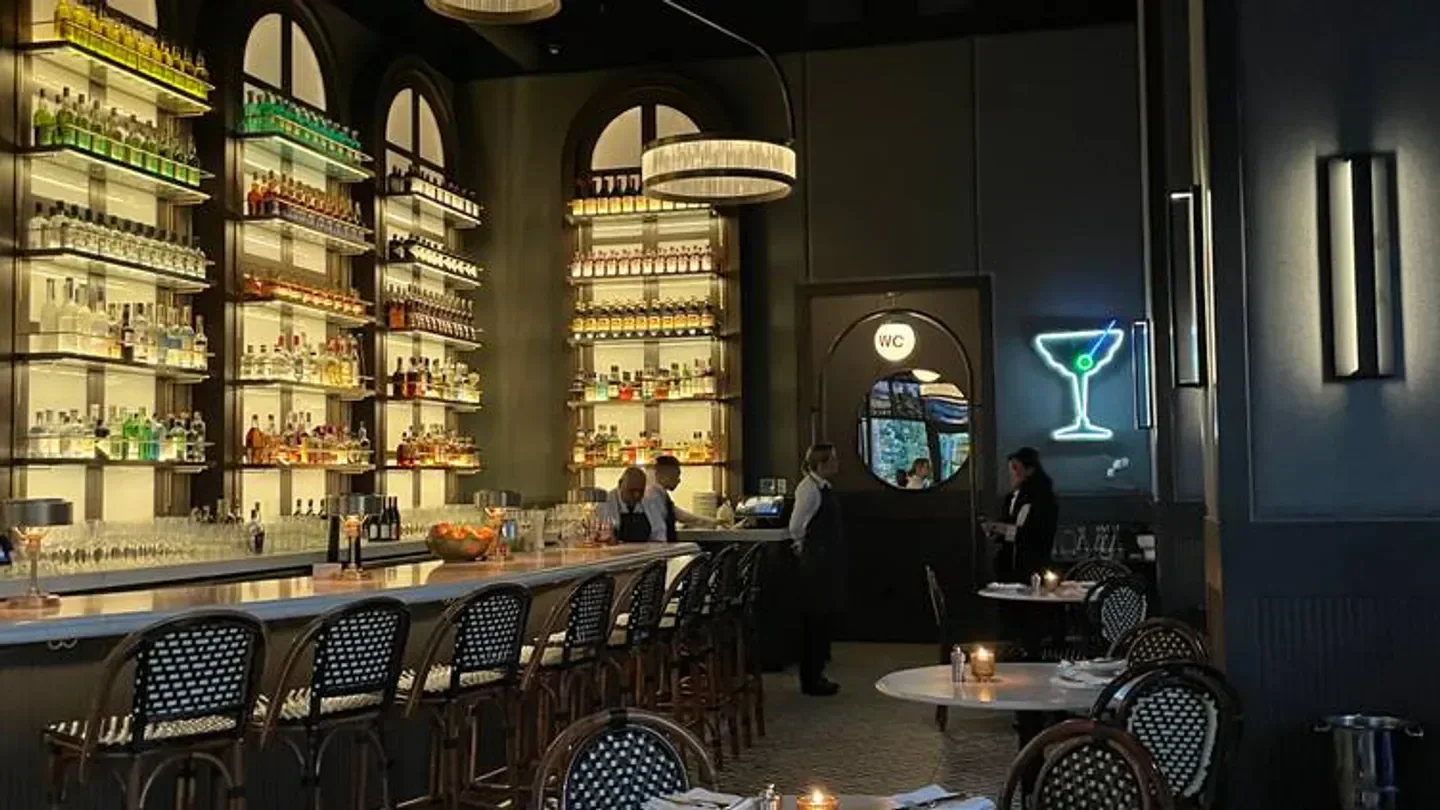 Interior view of La Connessa restaurant in San Francisco with bar and decor.