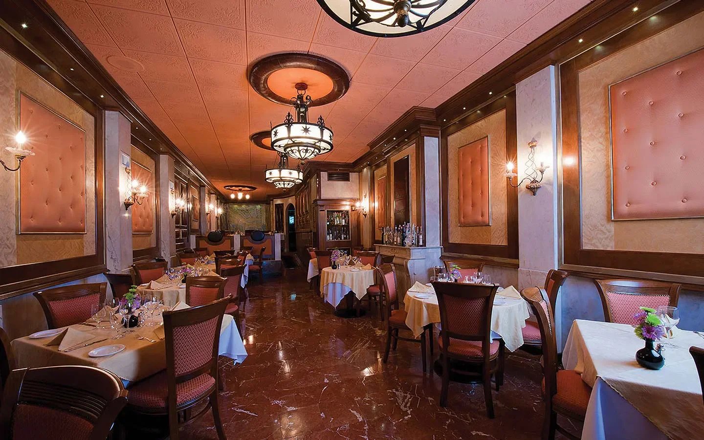 Elegant dining room at La Famiglia Ristorante in Philadelphia, ready for service.