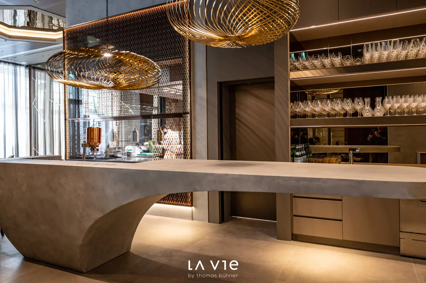 Modern interior of LA Vie by thomas bühner restaurant in Taipei with stylish lighting.