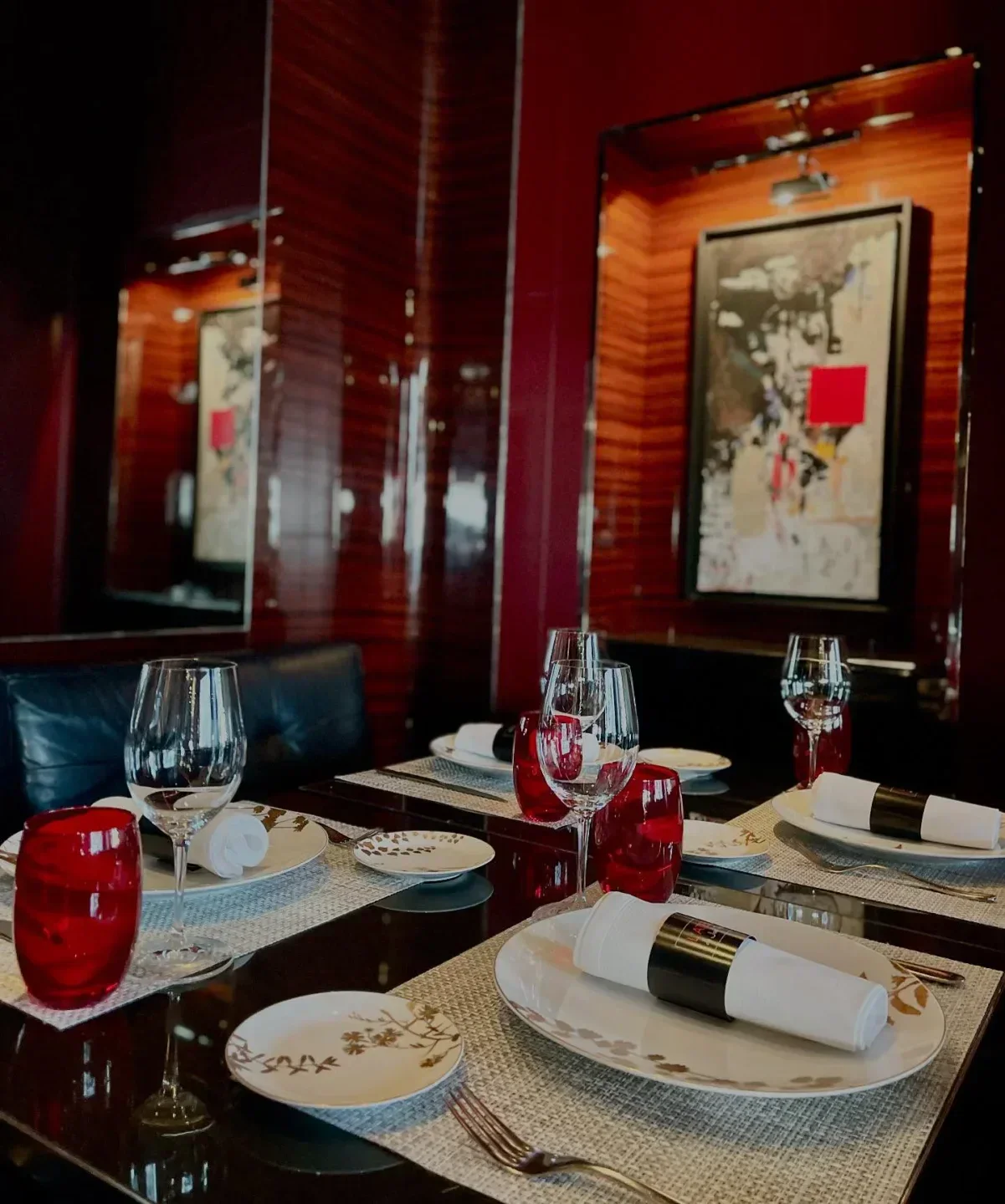 Elegant dining table setting at L'Atelier de Joël Robuchon - St-Germain, Paris restaurant