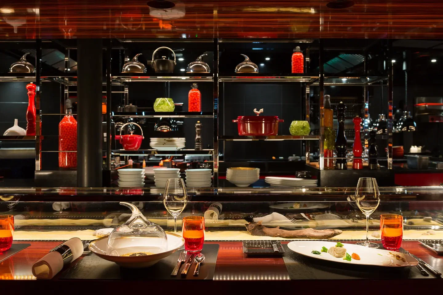 Elegant dining scene at L'Atelier Robuchon - Geneva, showcasing fine cuisine in Geneva.