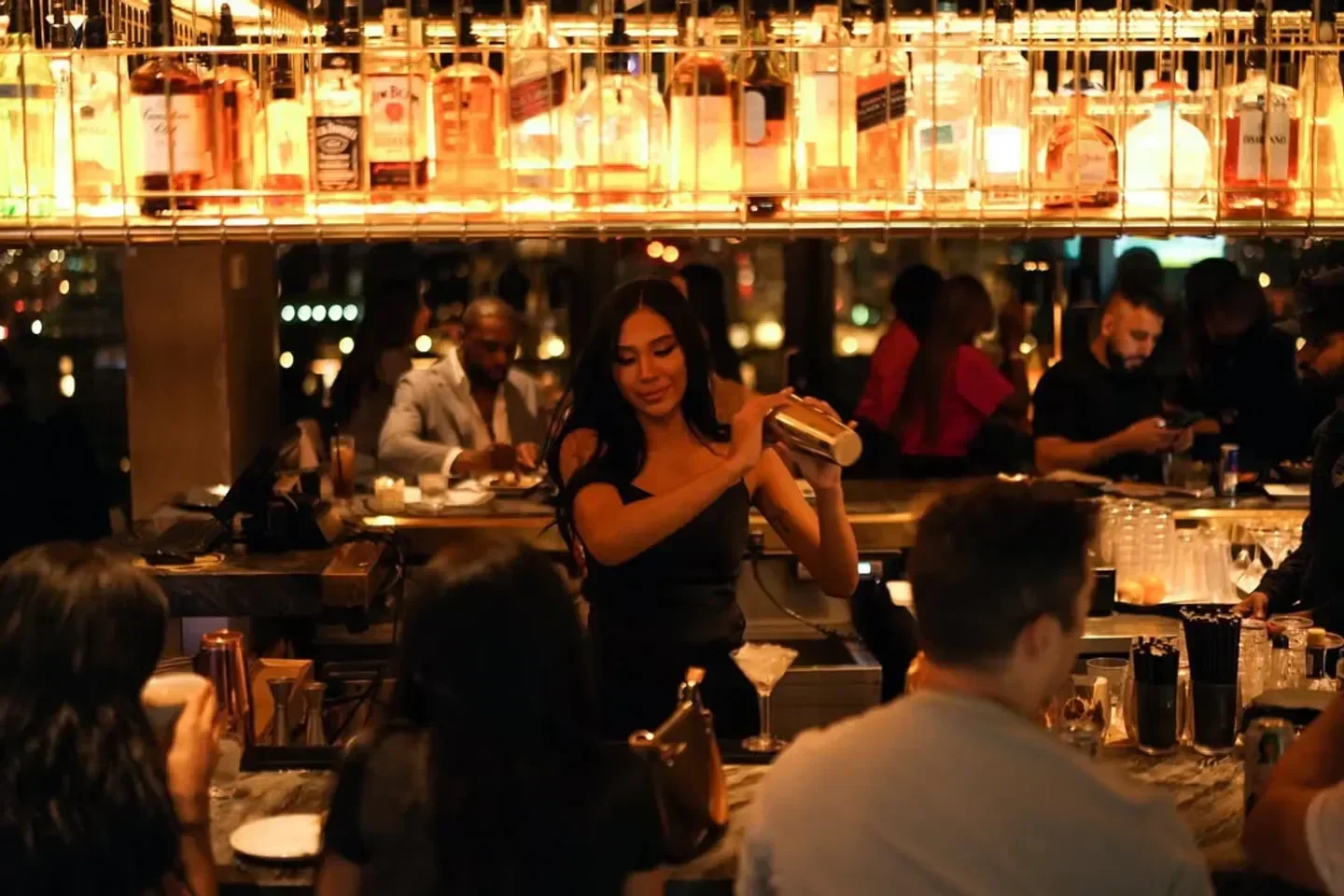 Lavelle Toronto bartender mixing a cocktail at the bar, restaurant scene