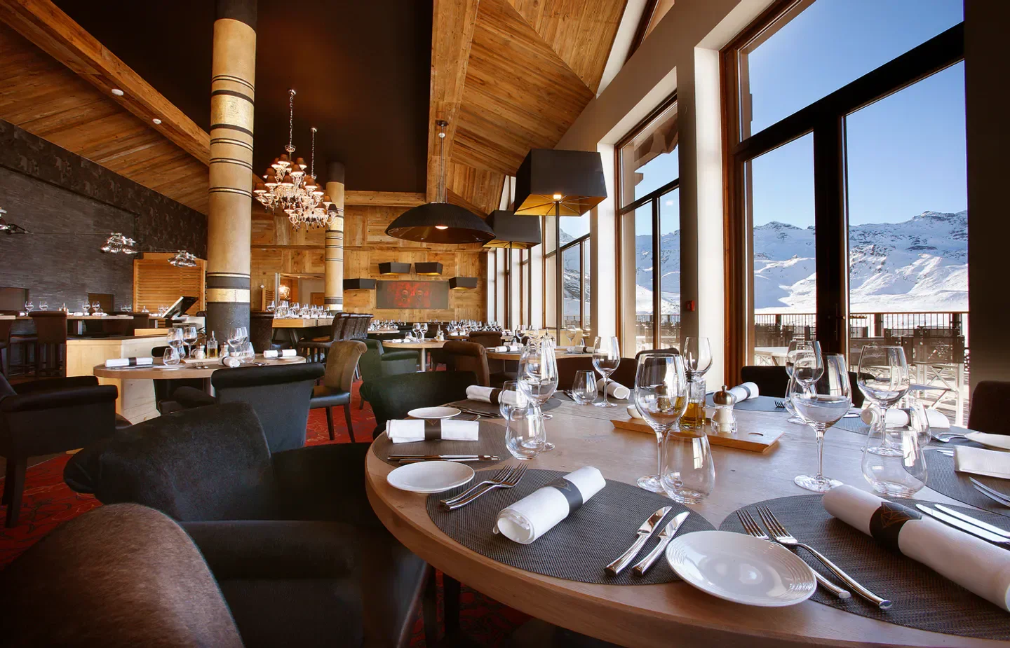 Interior of Le Diamant Noir restaurant in Val Thorens, with mountain views