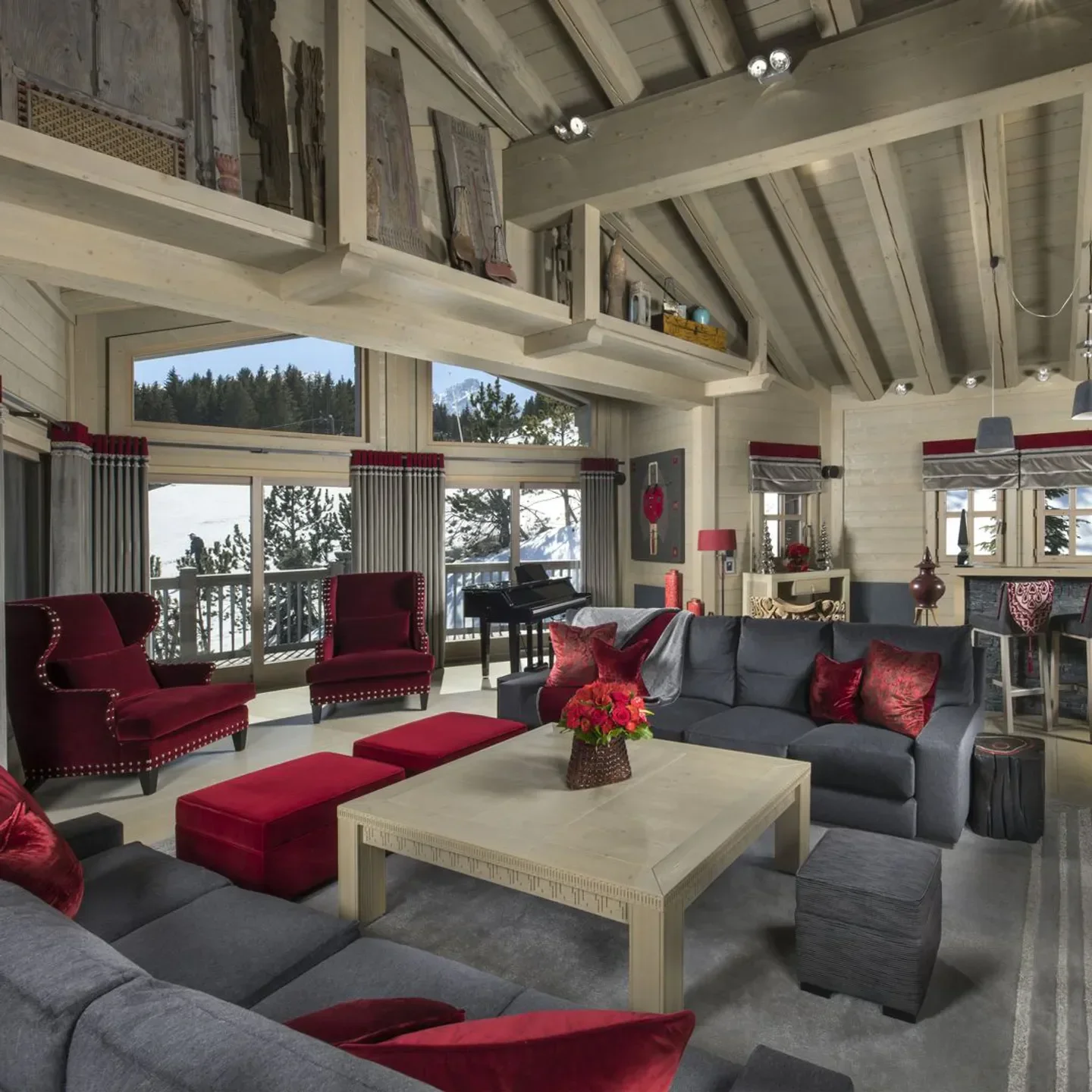 Cozy interior of Le Sarkara restaurant in Courchevel with mountain views and elegant furnishings.