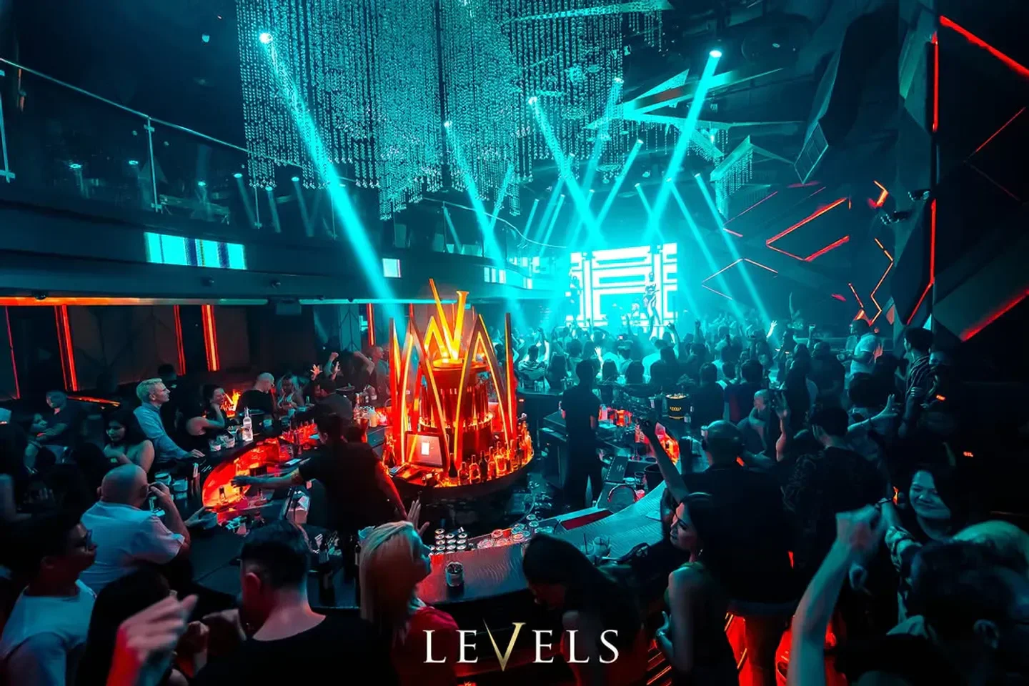 Levels Club & Terrace nightclub in Bangkok, with vibrant crowd and lighting.