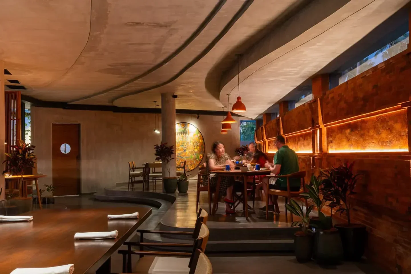 Interior dining space at Locavore NXT in Bali with diners enjoying their meal.