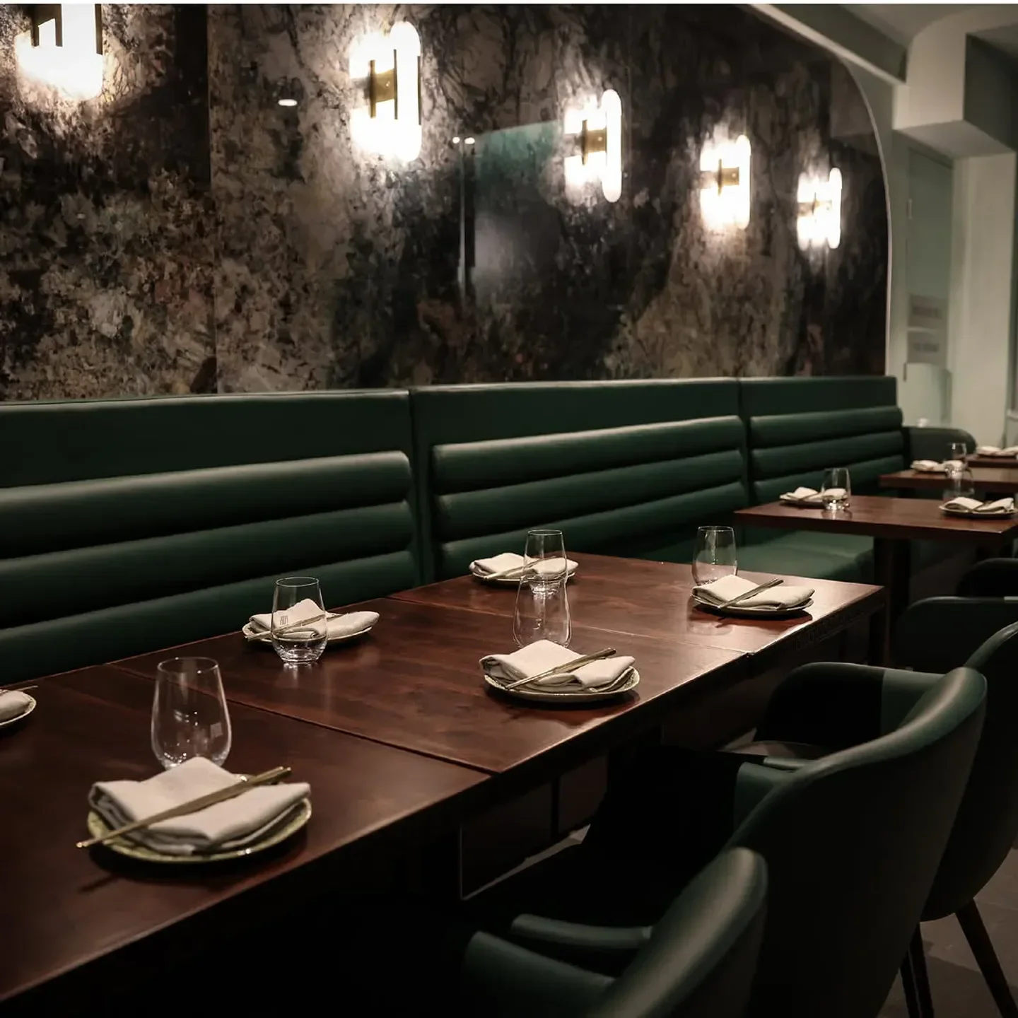 Interior dining at MANI Restaurant in Sydney, featuring stylish seating and elegant decor.