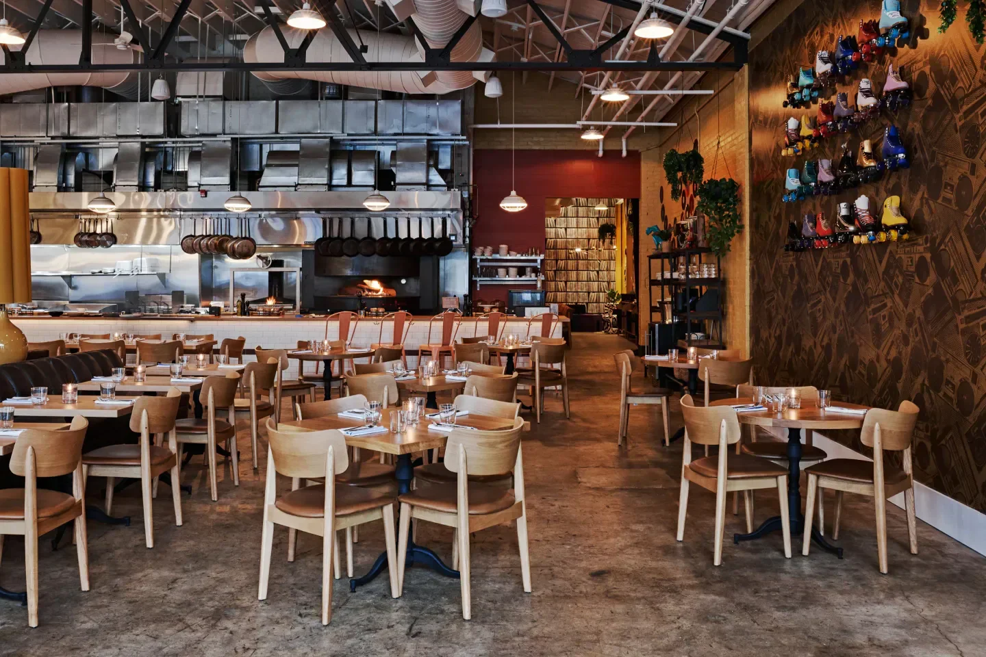 Interior of Marcus Bar & Grille in Atlanta, featuring stylish seating and an open kitchen.