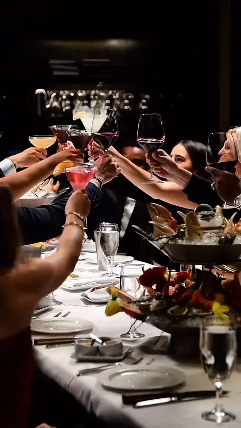 Cheers at Mastro's Steakhouse in Washington D.C., a celebratory dining experience in Washington