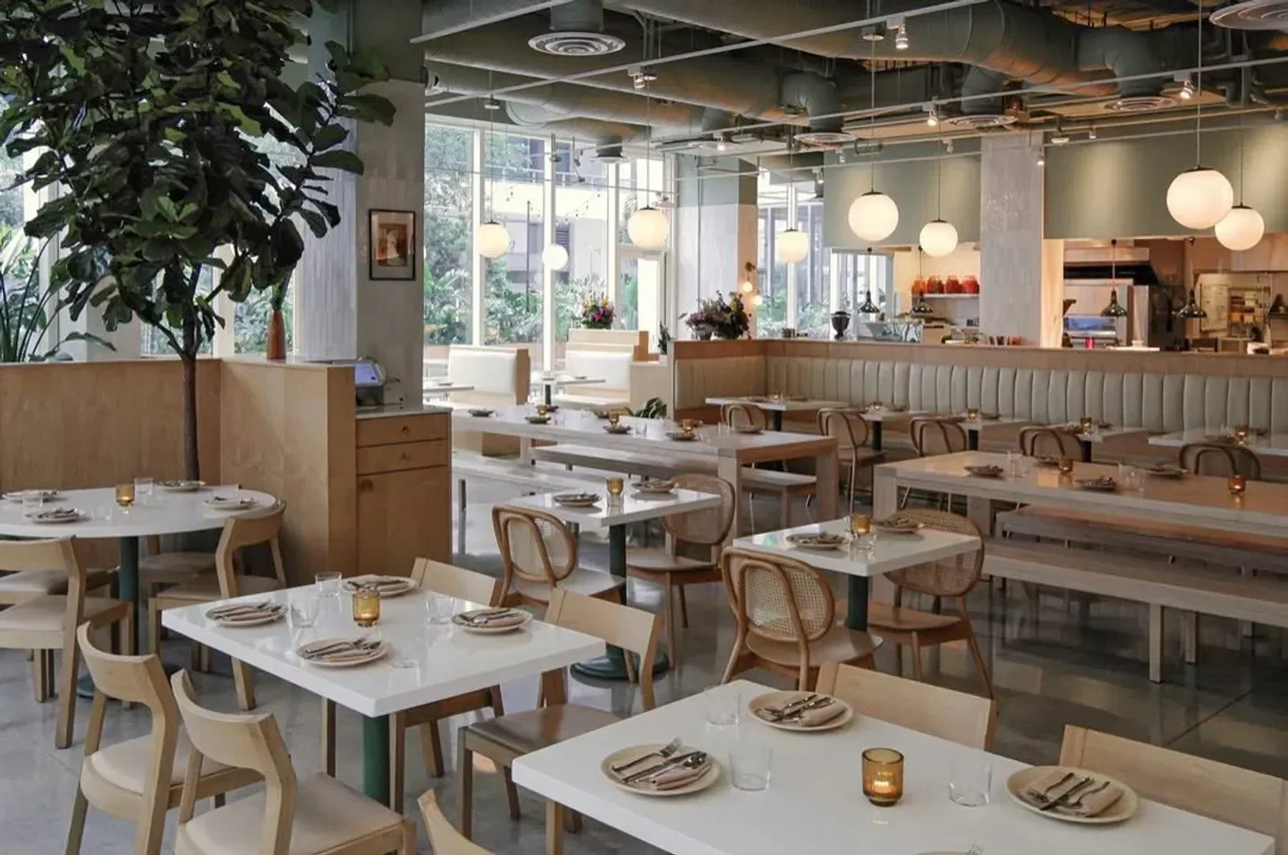 Interior of Maty's restaurant in Miami, featuring tables, chairs, and stylish decor.