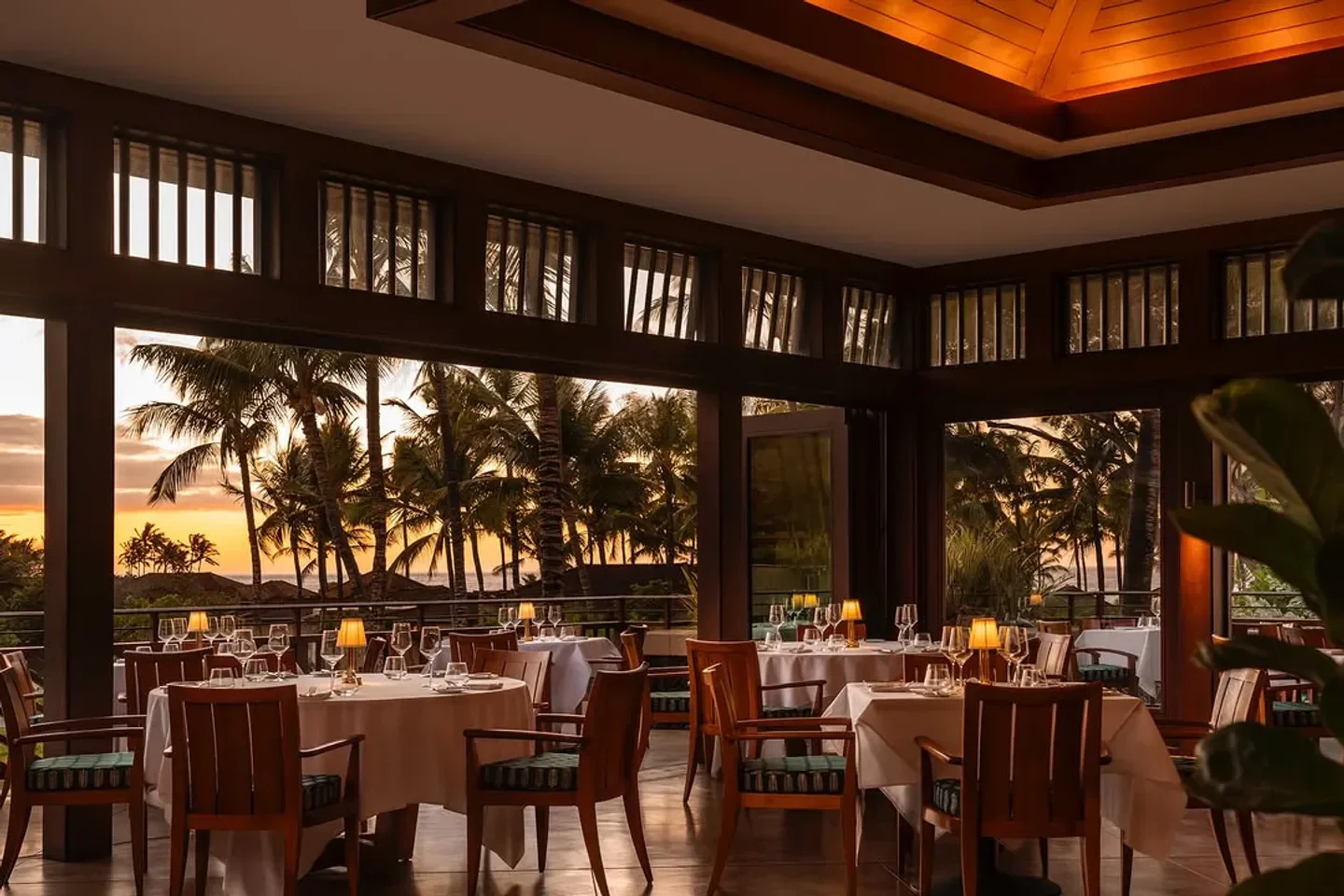 Miller & Lux restaurant in San Francisco with sunset view through the windows.