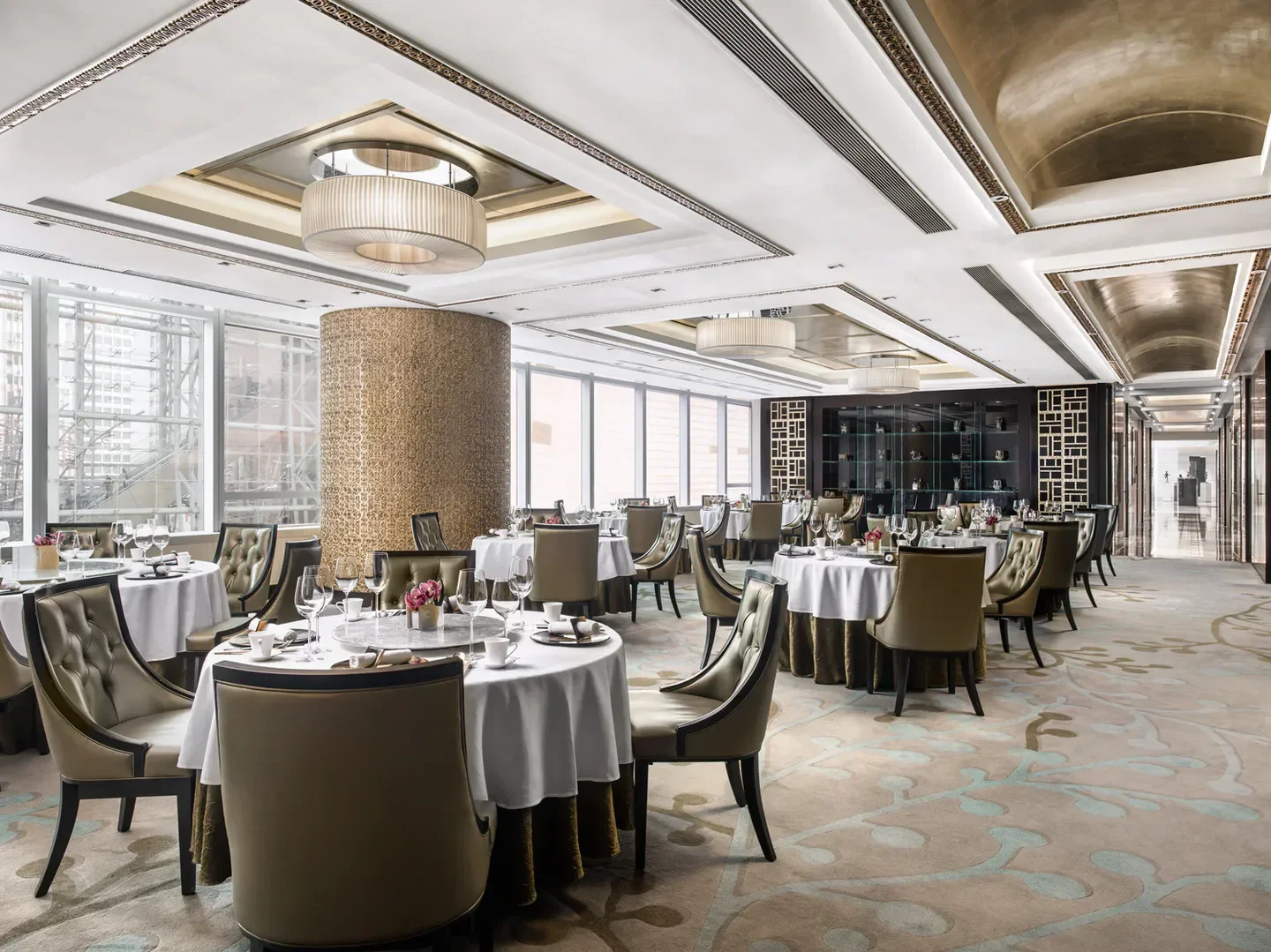 Elegant dining room interior at Ming Court (Mong Kok), Hong Kong, with round tables.