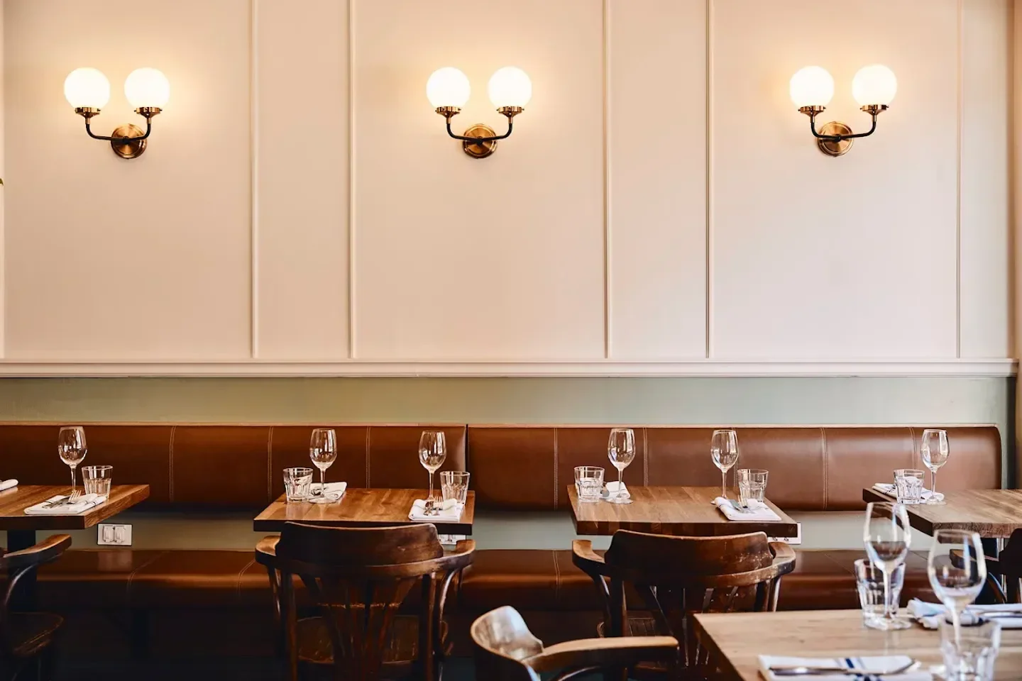 Interior view of Moccione restaurant in Montreal, featuring stylish decor and seating
