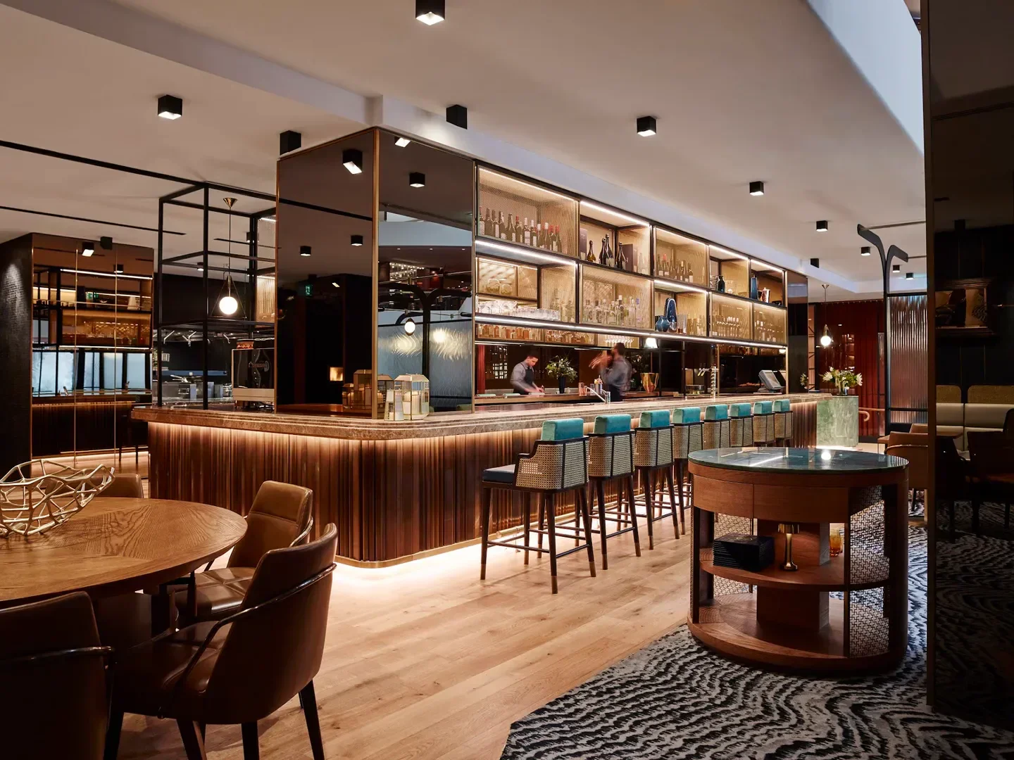 Interior of Mode Kitchen & Bar in Sydney, showcasing a stylish restaurant bar and seating area.