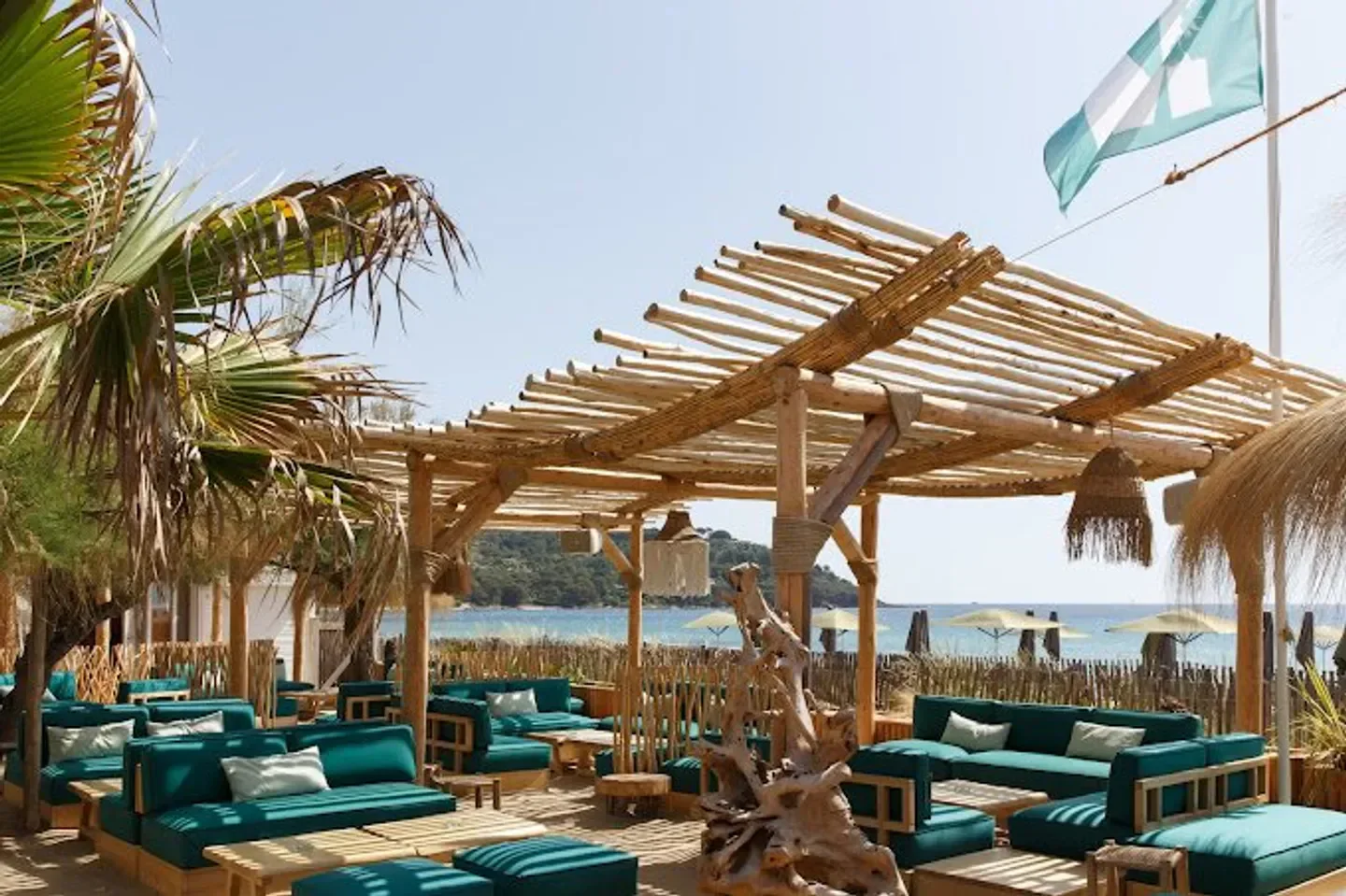 Beachfront seating at Moorea Plage in Saint-Tropez, a luxurious beach club destination.