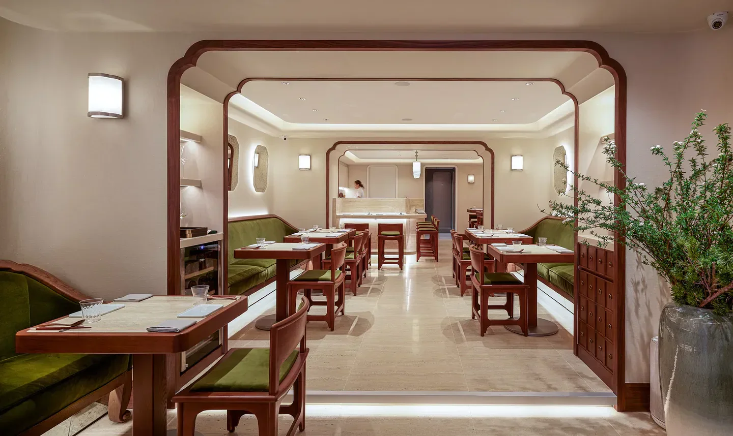 Elegant interior of Mora restaurant in Hong Kong, featuring stylish seating and design.